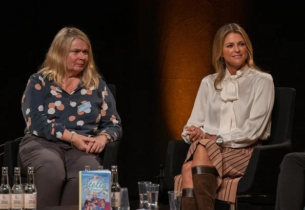 Princess Madeleine wore Dagmar Sabina pleated midi skirt. Princess at the launch of her book Stella and the Secret