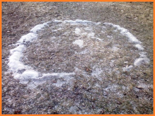 Only a small line of snow remains of what were once walls.  The ground around it is brown with only a hint of snowdust.