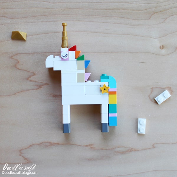 Lego pieces needed to build the most epic Lego Unicorn with a rainbow colored mane, gold tiara and horn, rainbow colored waterfall tail and star cutie mark on the flank!