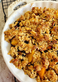 Peach Blueberry & Ginger Crisp:  Nothing tastes more like summer than juicy sweet peaches with bursts of tart blueberries laced with ginger, all topped with a crunchy buttery topping. - Slice of Southern