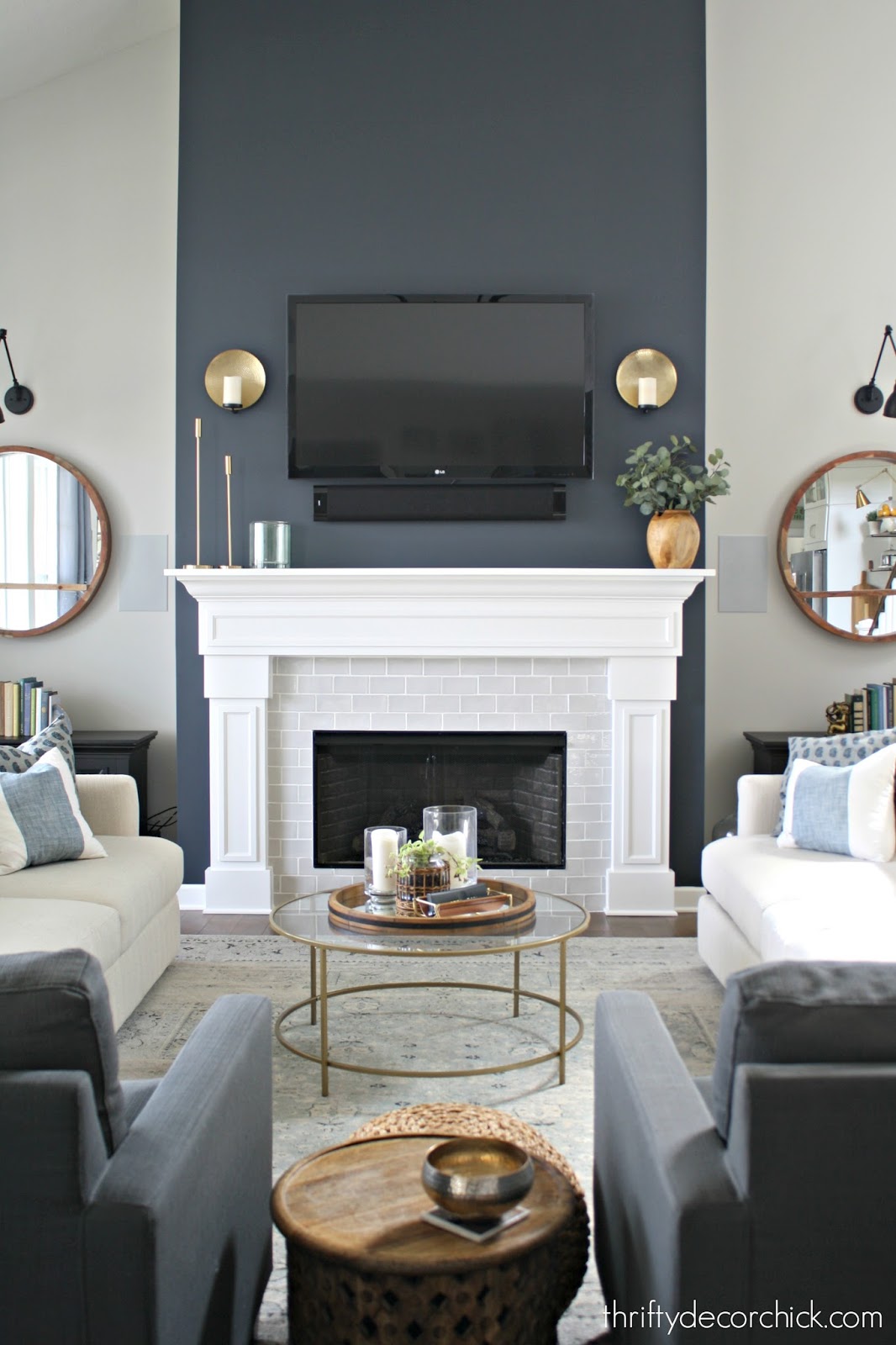 Dark blue/gray paint color on fireplace wall