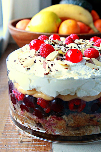 Freshly whipped cream, yummy custard, fruits plus Italian Panettone or any sponge cake make this a delicious and party-perfect Trifle!  Cherry, Raspberry and Panettone Trifle