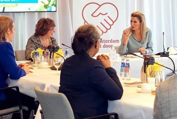 Queen Maxima paid a working visit to the Regional Work Center. Natan brown cahmere wool coat, sky blue silk shirt, zara prince of wales skirt