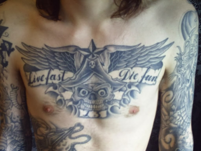 Chest Tattoo Designs for Guys title=
