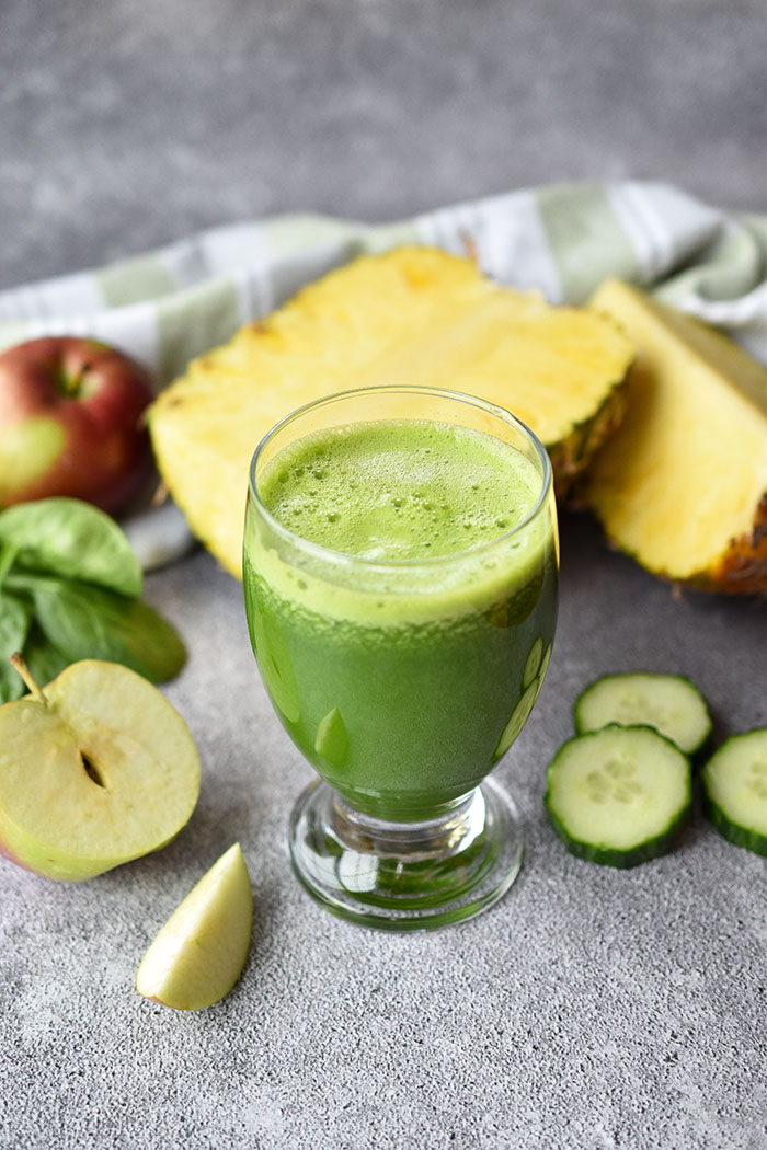 Woman in Real Life Pineapple Spinach Green Juice