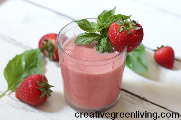 Delicious vegan smoothie with strawberries basil lime