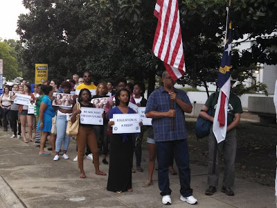 They marched around the governor's mansion in Raleigh.