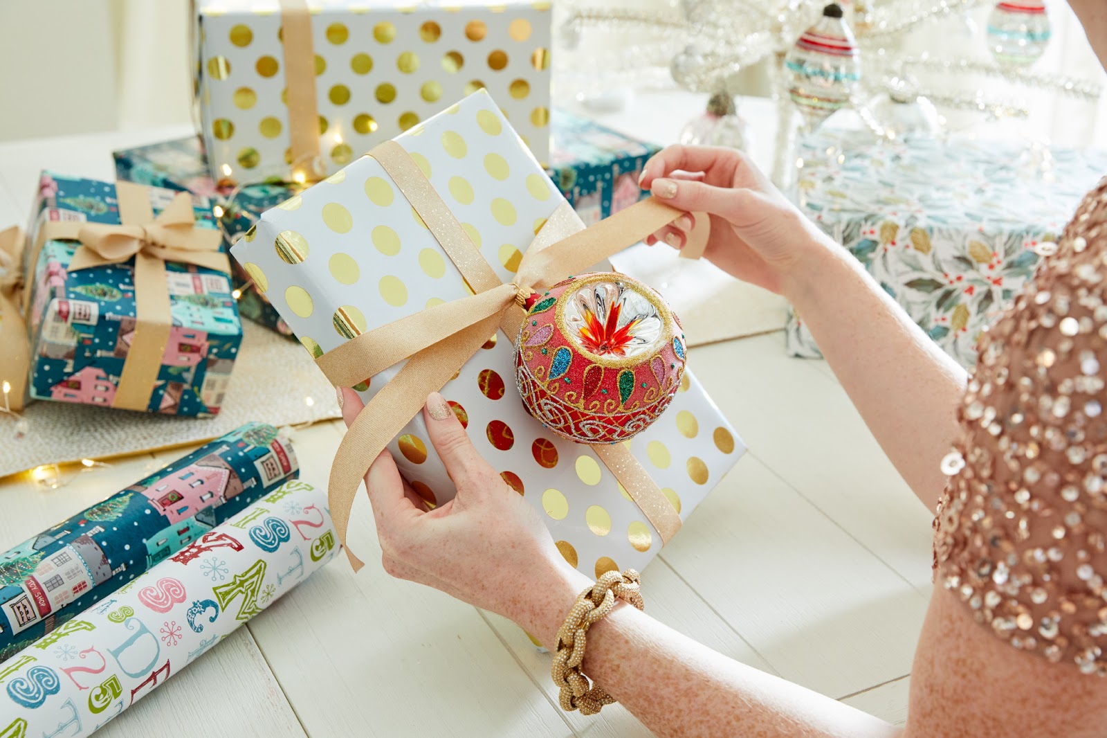 Using ornaments as gift wrap decor 