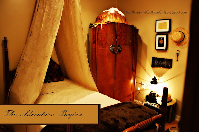 photo of a bedroom with a twin bed with canvas tent over it, wooden wardrobe with a volcano on top, lantern light | Adventure Room, Adventure Bedroom, archaeology, Indiana Jones room, by Rosevine Cottage Girls
