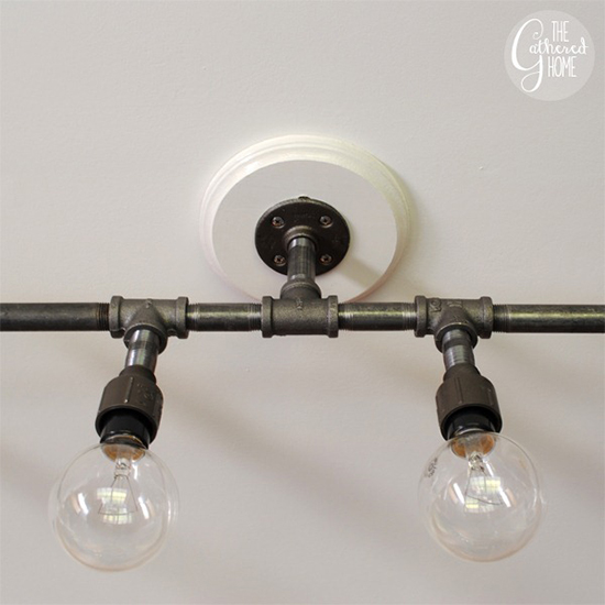 Desain lampu gantung unik dari pipa besi bekas