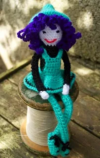 http://www.craftsy.com/pattern/crocheting/toy/crochet-witch/69410