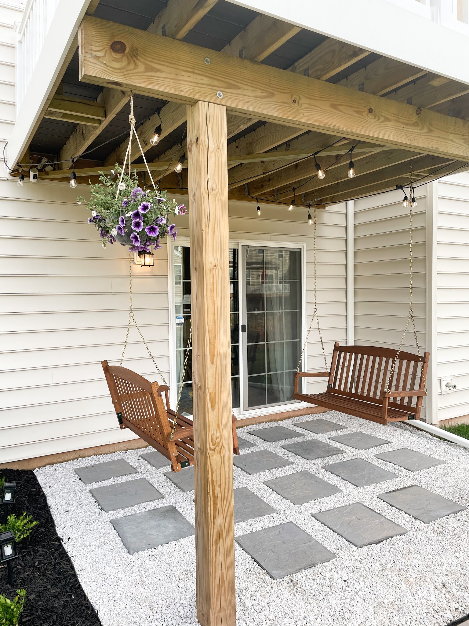 DIY PAVER AND MARBLE GRAVEL PATIO WITH MULCH BEDS & PORCH SWINGS A