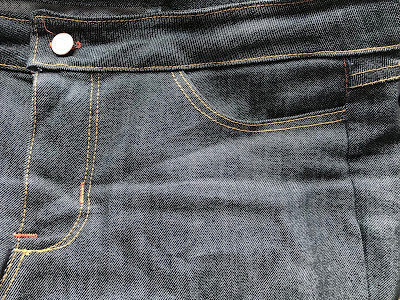 Topstitching on a pair of jeans sewn using the Janome Magnolia 7325 sewing machine.