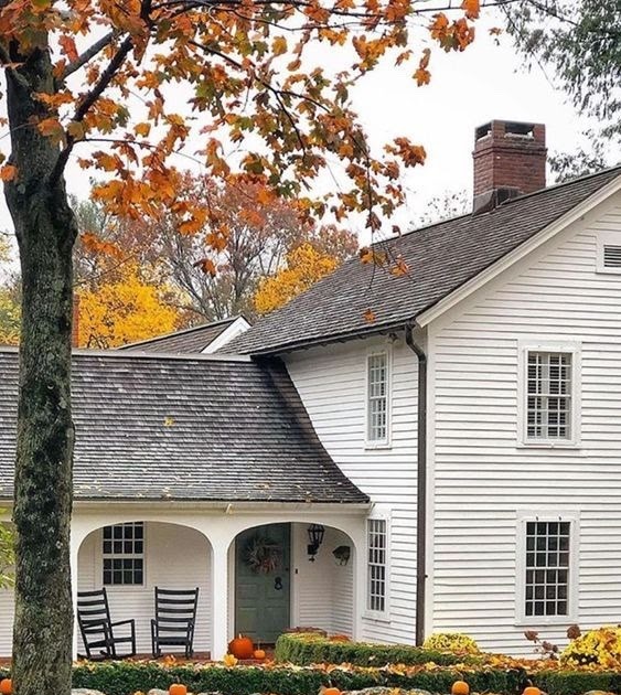 Content in a Cottage Beautiful White Clapboard House in Fall