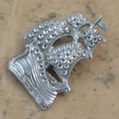 Sailing ship brooch in Staybrite by Charles Horner