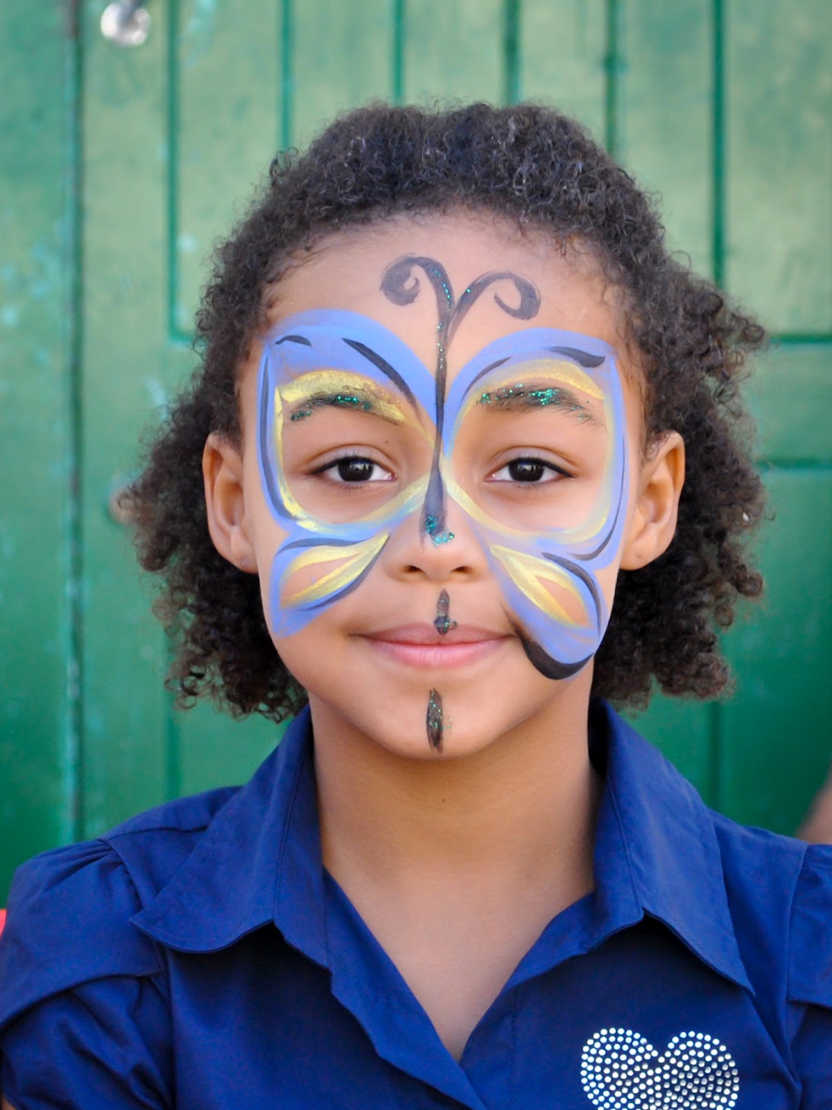 Budding Artists Face Painting on Car Free Day in Collaboration with