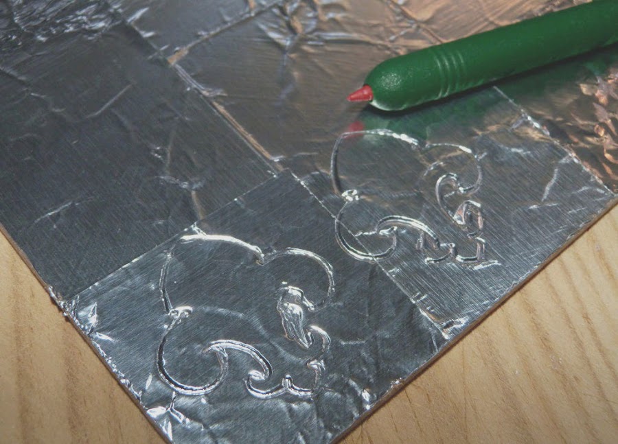 relieve-punzon-aluminio-adhesivo