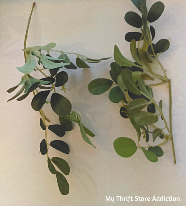 Cut extra sprigs from longer pieces of existing greenery to fill in bare spots on a thrift store boxwood wreath! mythriftstoreaddiction.blogspot.com Thrift store boxwood wreath upcycle