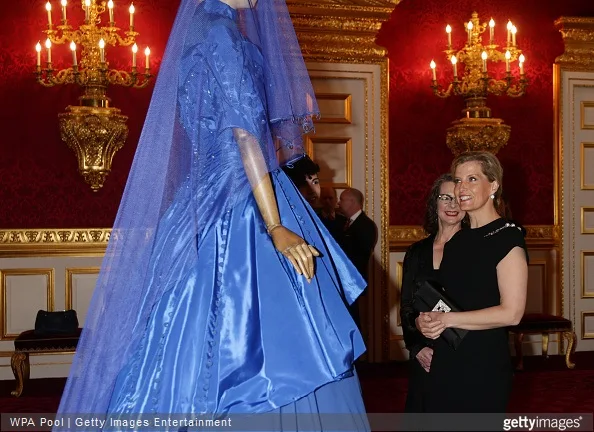 Sophie, Countess of Wessex looks at a dress on display during a reception for the London College of Fashion at St James's Palace