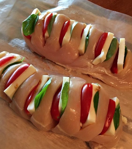 Hasselback Chicken is stuffed with mozzarella, tomato and basil making it a new and delicious way to enjoy chicken for dinner!