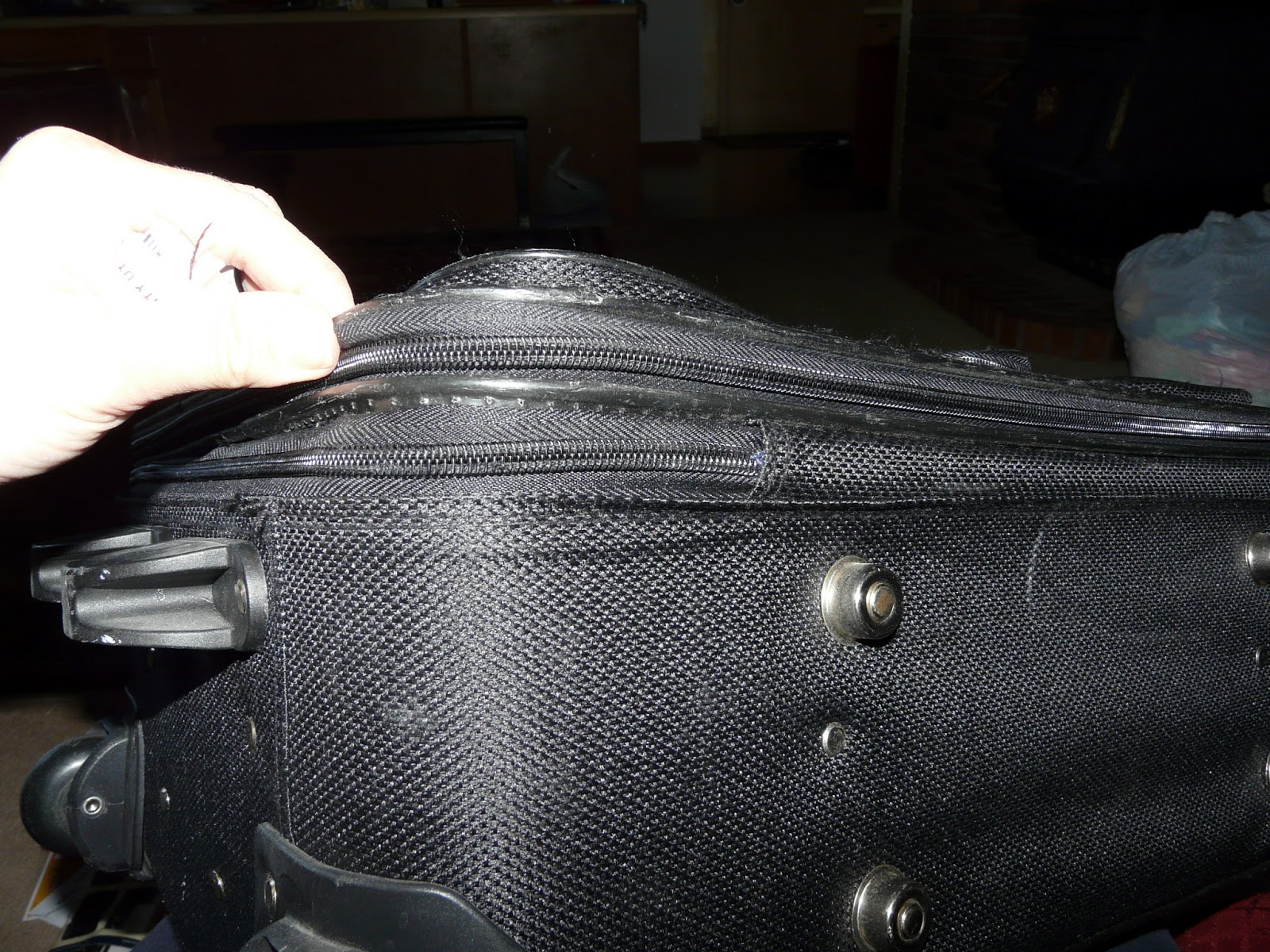 The "Secret" is Gratitude Fixing the Seam on a Suitcase