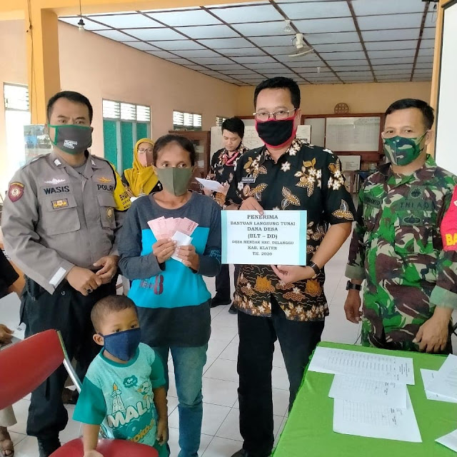 Babinsa koramil 03/delanggu amankan pembagian BLT