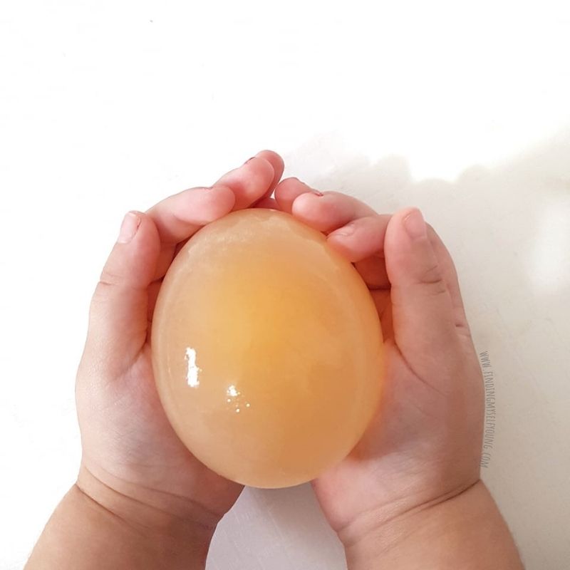 bouncy egg in childs hand