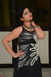 Shrisha Dasari in Sleeveless Short Black Dress At Follow Follow U Audio Launch 006