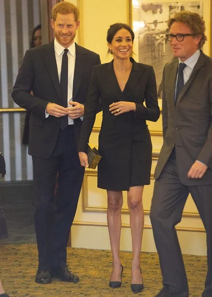 Meghan Markle wore Judith & Charles Digital Dress, Paul Andrew pumps, carried Jimmy Choo clutch. Prince Harry