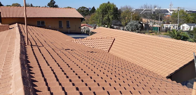 Waterproofing and painted low pitch tile roof