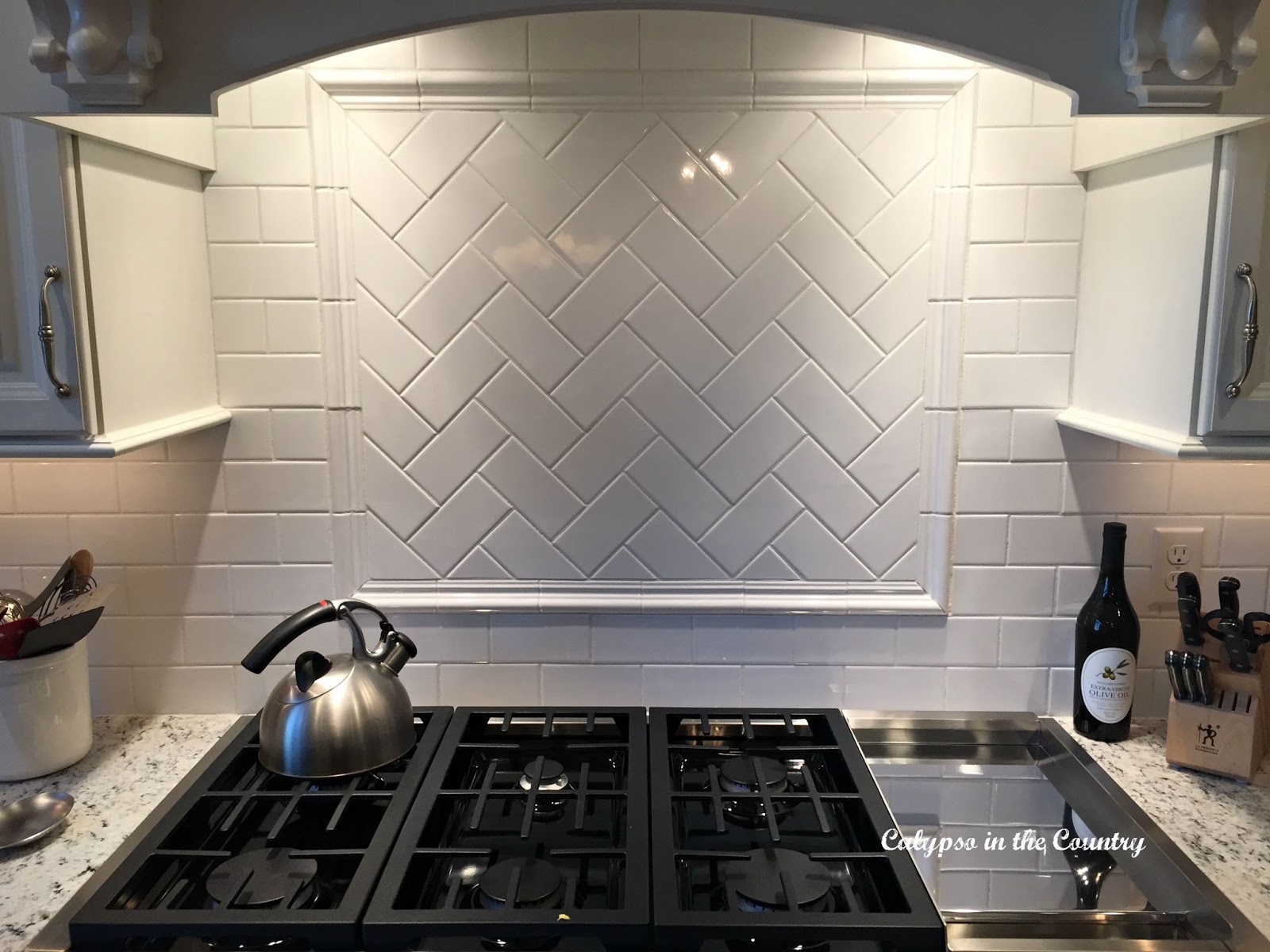 Subway Tile Backsplash with Herringbone Design