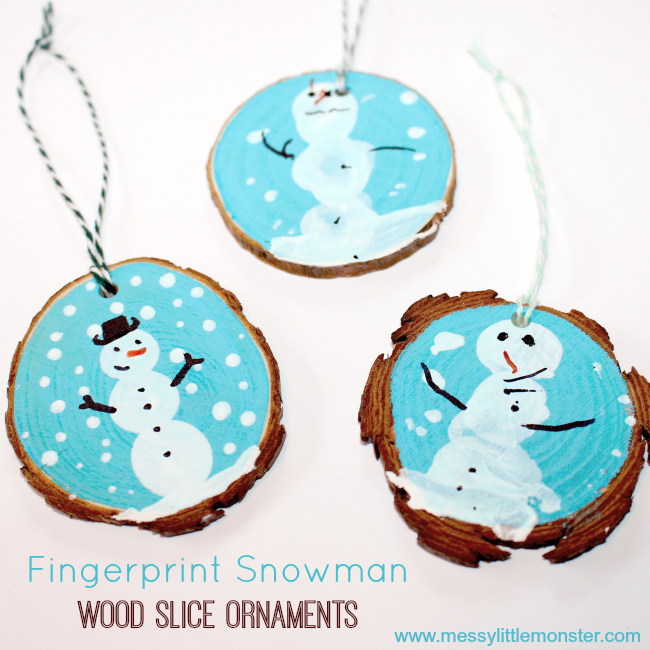 Fingerprint Snowman Wood Slice Ornament. A cute kid made Christmas ornament and keepsake. Toddlers, preschoolers and older children can have fun with this rustic Christmas craft.