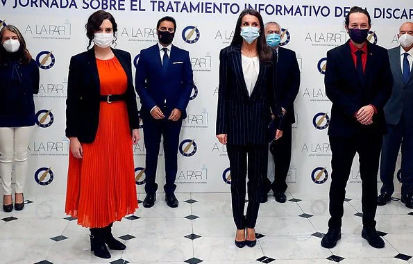 Queen Letizia wore a new striped suit blazer from Hugo Boss. Letizia wore Hugo Boss Kocani striped suit. Magrit pumps, Carolina Herrera clutch