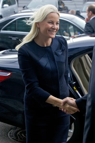 Crown Princess Mette-Marit of Norway opens the Dangerous Waste conference in Tonsberg. wears Velentino dress