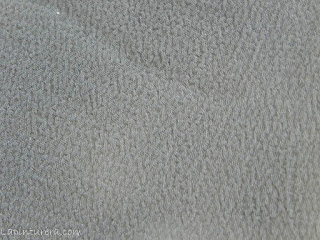 textura del guante exfoliante corporal