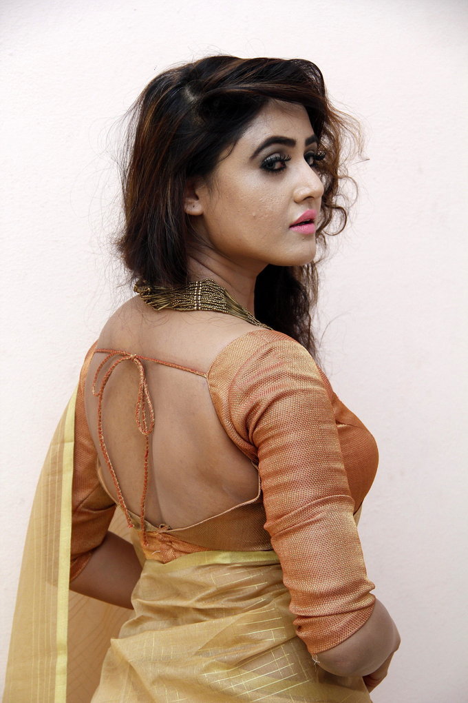 Telugu Hot Girl Sony Charishta latest Photos  In Yellow Saree