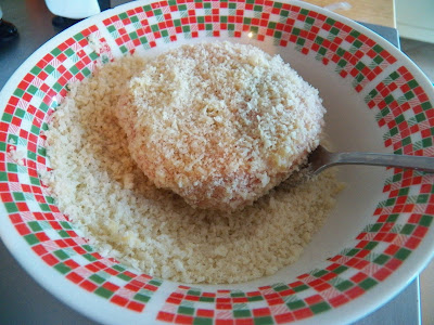 Pork patty pressed into panko bread crumbs