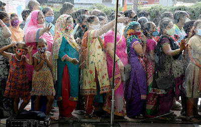 Beneficiaries wait in a queue to receive a dose of the Covid-19 vaccine during a vaccination drive, in Mumbai on 11 August 2021ANI