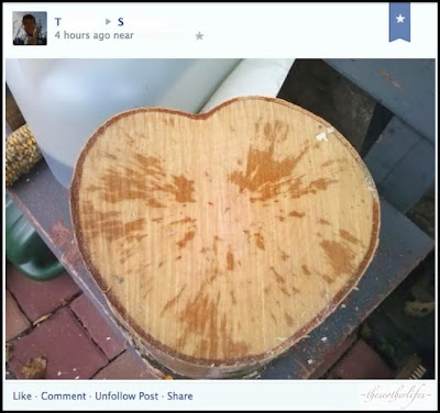 Heart-shaped wood disk.