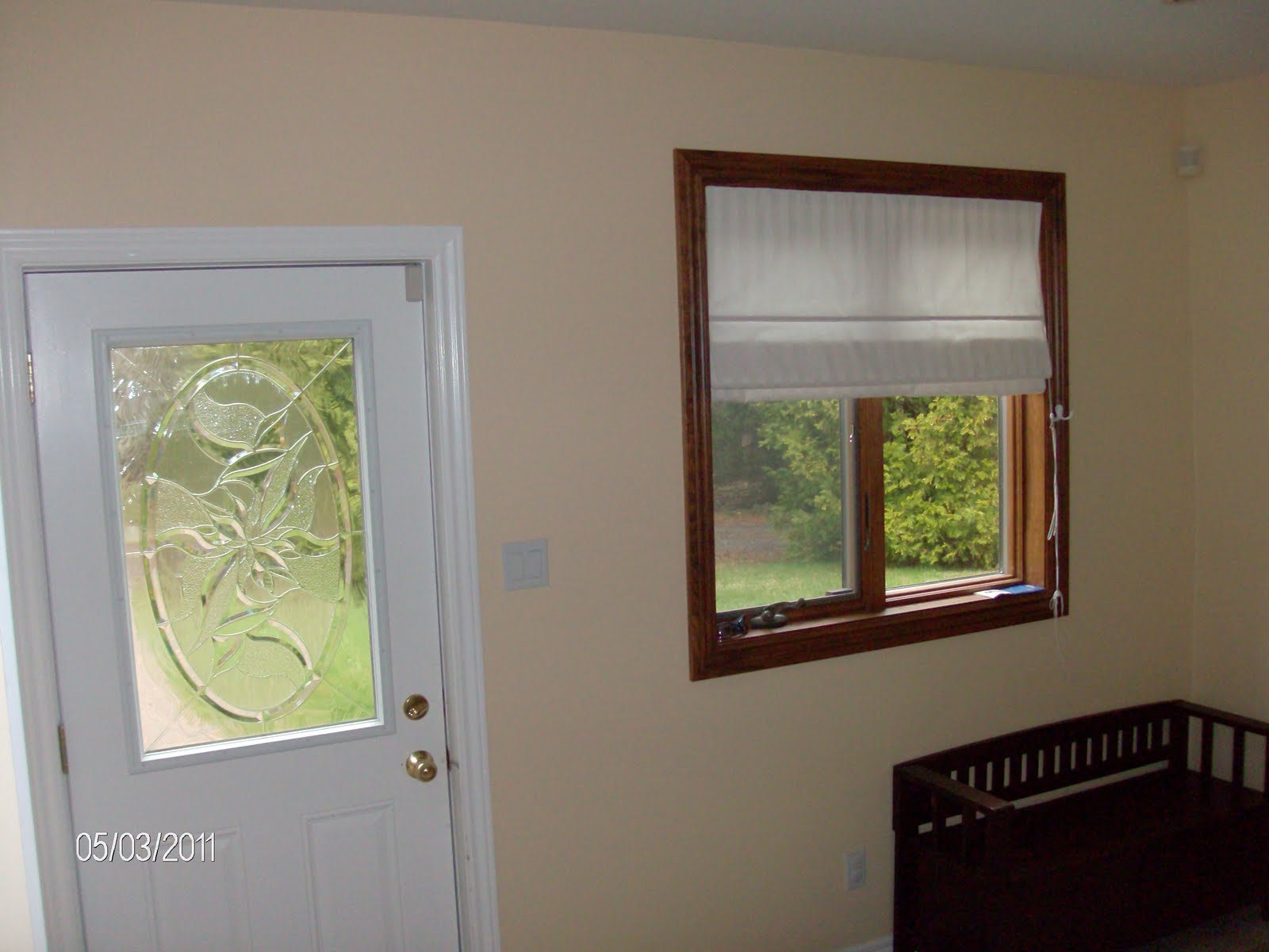 Custom Interiors Roman shade for front entrance.