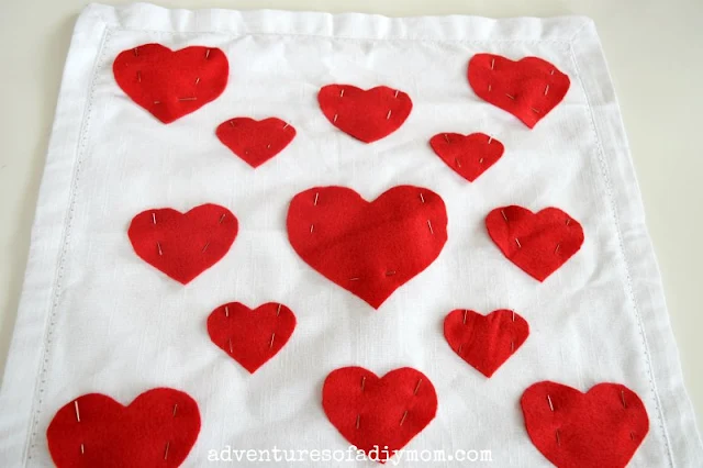pin hearts to pillow