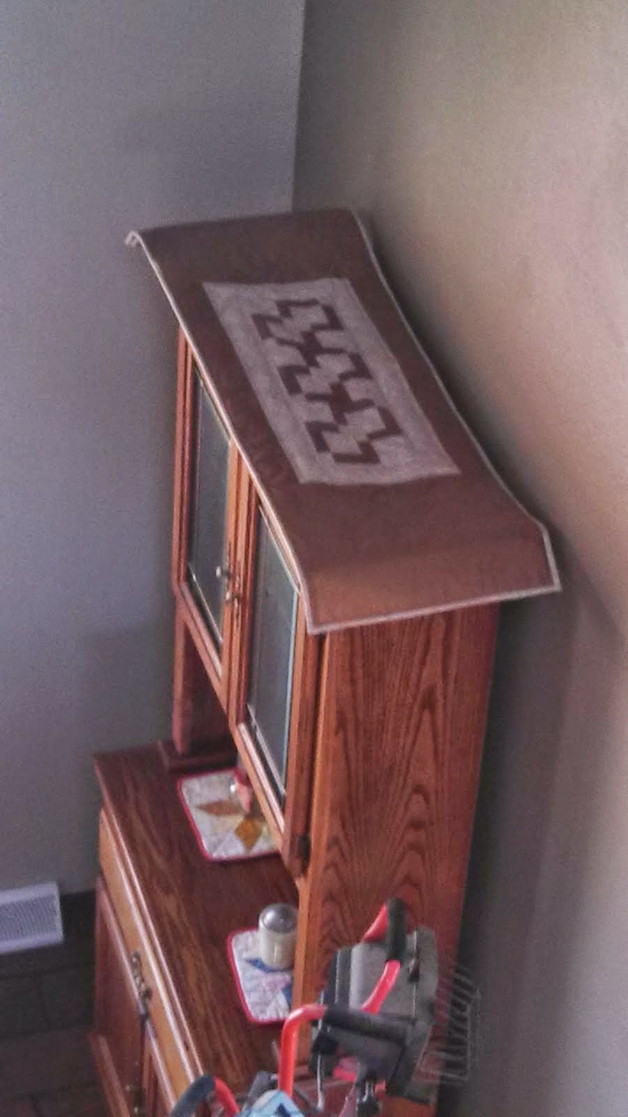 quilting time Top of hutch covered!