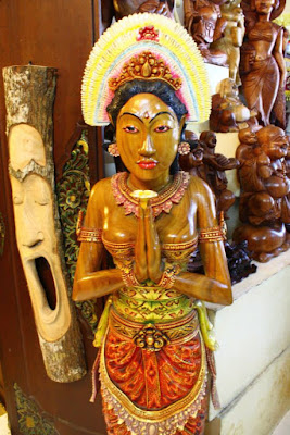 Wooden statue of traditional Balinese dancer Ubud Bali