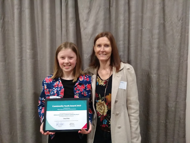 Lucy with her Youth Community Award