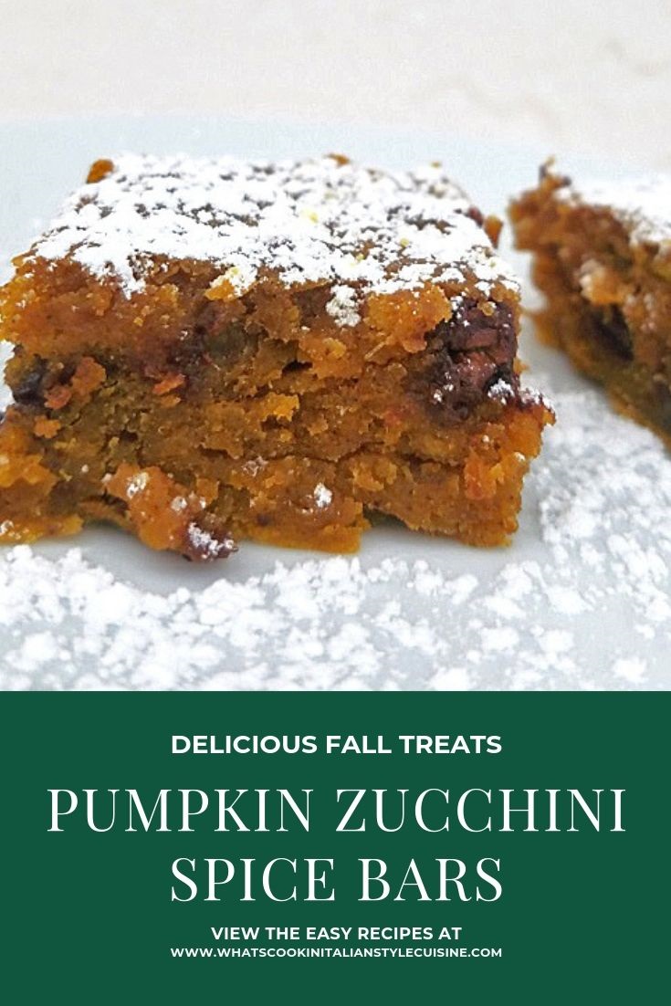 this are a delicious bar with all the fall flavors. These bars are pumpkin, spices and zucchini. They are cut into squares, orange in color with chocolate chips and dusted with powdered sugar