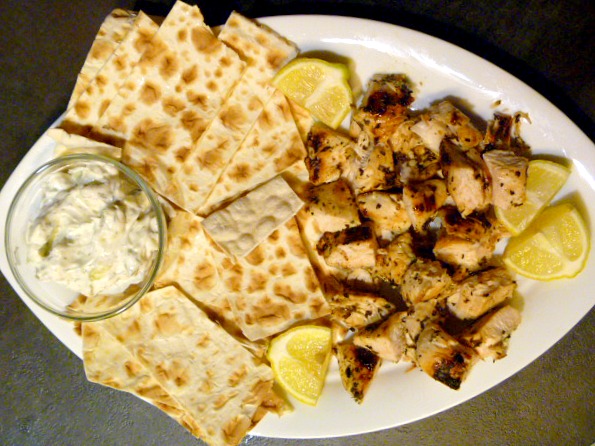 I'm revealing my famous Easy Entertaining Chicken Souvlaki:  Plump, juicy chicken breasts marinated with Greek flavors such as lemon, garlic, oregano, and wine. This easy summer dish turns finger food up to a new level. - Slice of Southern