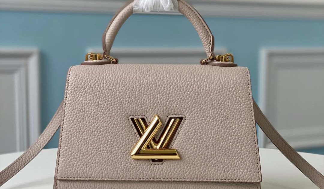 Eluxury Company - Introducing the Twist One Handle PM handbag in