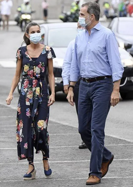 Queen Letizia wore a floral jumpsuit from Uterque, which she had worn before, and espadrille wedges from Macarena