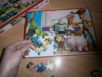 handsized pieces to help children complete the puzzle of favourite toy story characters