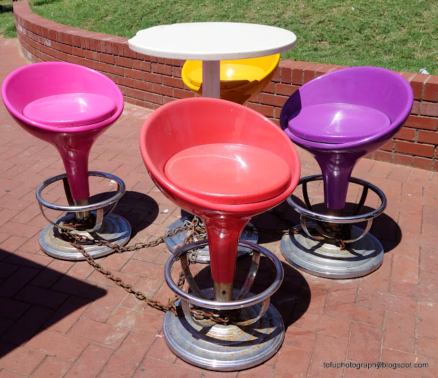 Tofu Photography Locked up plastic chairs at the Wimpy fast food